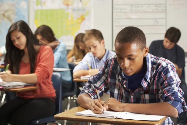 Kids sitting at desks in a classroom