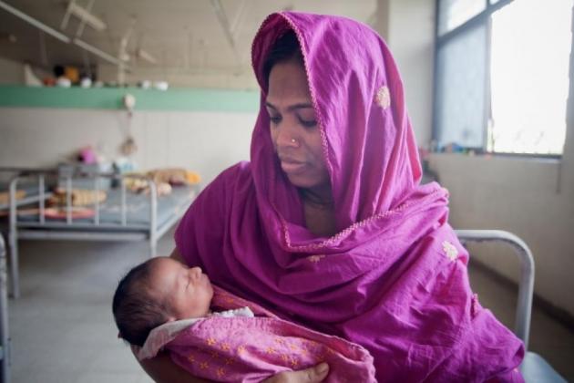 Woman holding baby