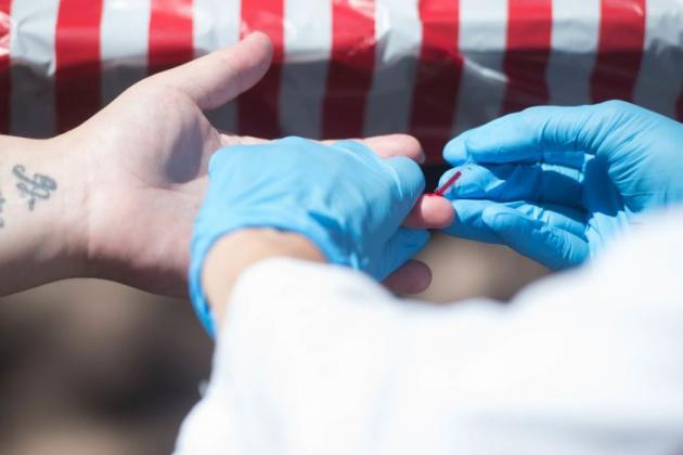 An HIV test is administered by a public health nurse with the Saskatchewan Health Authority in June 2018.	BRANDON HARDER / REGINA LEADER-POST